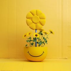 yellow-vase-with-smiley-face-sunflowers-it-generative-ai (1) (1)